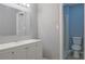 Clean bathroom with white vanity, grey walls, and a shower/tub combo at 3575 Oakvale Rd # 305, Decatur, GA 30034