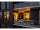 Luxury apartment balcony with string lights and comfortable seating at 3107 Peachtree Ne Rd # 1502, Atlanta, GA 30305