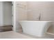 Luxurious bathroom with freestanding bathtub and modern tile at 3107 Peachtree Ne Rd # 1502, Atlanta, GA 30305