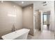 Bathroom with soaking tub and glass shower enclosure at 3107 Peachtree Ne Rd # 1502, Atlanta, GA 30305