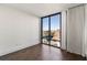 Bright bedroom featuring hardwood floors and city views at 3107 Peachtree Ne Rd # 1502, Atlanta, GA 30305