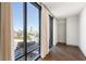 Bedroom with hardwood floors and large windows at 3107 Peachtree Ne Rd # 1502, Atlanta, GA 30305