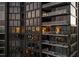Modern high-rise building with numerous balconies at dusk at 3107 Peachtree Ne Rd # 1502, Atlanta, GA 30305