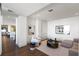 Spacious living room with comfortable seating and large artwork at 3107 Peachtree Ne Rd # 1502, Atlanta, GA 30305