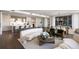Spacious living area with hardwood floors, open kitchen, and modern furniture at 3107 Peachtree Ne Rd # 1502, Atlanta, GA 30305