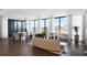 Open concept living area with hardwood floors and city views at 3107 Peachtree Ne Rd # 1502, Atlanta, GA 30305