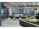 Covered outdoor patio with fireplace and comfortable seating at 3107 Peachtree Ne Rd # 1502, Atlanta, GA 30305