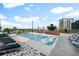 Stunning rooftop pool with city views and comfortable lounge chairs at 3107 Peachtree Ne Rd # 1502, Atlanta, GA 30305