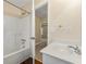 Bathroom with shower/tub combo and white vanity at 1960 Holland Park Dr, Buford, GA 30519