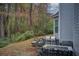 Backyard patio with seating area and gas grill at 3579 Oakshire Se Way, Atlanta, GA 30354
