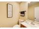 Clean bathroom with wood vanity, mirror, and neutral decor at 3579 Oakshire Se Way, Atlanta, GA 30354