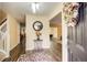 Bright entryway with hardwood floors, decorative mirror and wreath at 3579 Oakshire Se Way, Atlanta, GA 30354