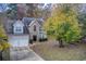 Two-story house with stone accents and a landscaped yard at 3579 Oakshire Se Way, Atlanta, GA 30354