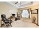 Bright home office features a large window, desk, and comfortable chair at 3579 Oakshire Se Way, Atlanta, GA 30354