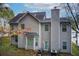 Rear view of house showing deck and landscaping at 3579 Oakshire Se Way, Atlanta, GA 30354