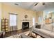 Living room features a fireplace, hardwood floors, and neutral colored furniture at 3579 Oakshire Se Way, Atlanta, GA 30354