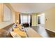 Spacious living room with bay window and dark hardwood floors at 3579 Oakshire Se Way, Atlanta, GA 30354