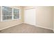 Bright bedroom with large window and spacious closet at 3661 Collins Dr, Douglasville, GA 30135