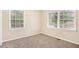 Spacious bedroom with neutral walls and carpet flooring at 3661 Collins Dr, Douglasville, GA 30135