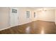 Bright living room featuring hardwood floors and neutral walls at 3661 Collins Dr, Douglasville, GA 30135