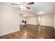 Spacious living room with hardwood floors and fireplace at 3661 Collins Dr, Douglasville, GA 30135
