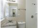 Clean bathroom with granite countertop, white vanity, and shower at 6677 Songwood Dr, Austell, GA 30168