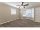 Spacious bedroom with bay window and neutral carpeting at 6677 Songwood Dr, Austell, GA 30168