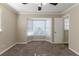 Bedroom with bay window and neutral carpeting at 6677 Songwood Dr, Austell, GA 30168