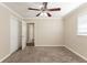 Bedroom with double closets and neutral carpeting at 6677 Songwood Dr, Austell, GA 30168