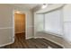 Bright dining area with bay window and laundry closet at 6677 Songwood Dr, Austell, GA 30168