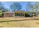 Ranch style home with large sunroom and backyard at 6677 Songwood Dr, Austell, GA 30168