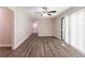 Bright living room featuring hardwood floors and sliding glass doors at 6677 Songwood Dr, Austell, GA 30168
