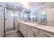 Double vanity bathroom with marble countertop and a large shower at 2846 Haven Ln, Decatur, GA 30030