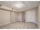 Finished basement area with neutral walls and flooring at 796 Vanderbilt Nw Ct, Atlanta, GA 30318
