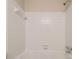 Updated bathroom with white tile shower/tub combo at 796 Vanderbilt Nw Ct, Atlanta, GA 30318