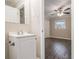 Bright bedroom featuring wood-look floors and ceiling fan at 796 Vanderbilt Nw Ct, Atlanta, GA 30318