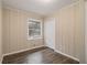 Charming bedroom with wood-look floors and neutral walls at 796 Vanderbilt Nw Ct, Atlanta, GA 30318