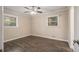 Bedroom with ceiling fan and wood-look flooring at 796 Vanderbilt Nw Ct, Atlanta, GA 30318