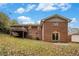 Brick house exterior with deck and backyard view at 796 Vanderbilt Nw Ct, Atlanta, GA 30318