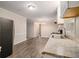 Eat-in kitchen with stainless steel appliances and wood-look flooring at 796 Vanderbilt Nw Ct, Atlanta, GA 30318