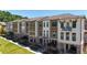 Townhomes with inviting front porches and landscaping at 358 Olmstead Way # 25, Alpharetta, GA 30022