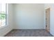 Bedroom with grey carpet, large window, and ensuite bathroom at 358 Olmstead Way # 25, Alpharetta, GA 30022