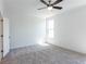 Spacious bedroom with grey carpet and ceiling fan at 358 Olmstead Way # 25, Alpharetta, GA 30022