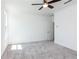 Well-lit bedroom featuring grey carpet and ceiling fan at 358 Olmstead Way # 25, Alpharetta, GA 30022