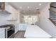 Spacious kitchen with stainless steel appliances and white cabinetry at 358 Olmstead Way # 25, Alpharetta, GA 30022