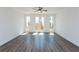 Bright living room with hardwood floors and access to a deck at 358 Olmstead Way # 25, Alpharetta, GA 30022