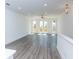 Bright living room with hardwood floors and access to a balcony at 358 Olmstead Way # 25, Alpharetta, GA 30022