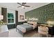 bedroom featuring a green floral wall and a comfy bed at 2810 Herrington Dr, Cumming, GA 30041