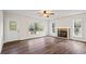 Spacious living room with hardwood floors and fireplace at 2855 Highway 20 Se, Conyers, GA 30013