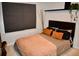 Charming bedroom with a queen-size bed and stylish decor at 100 Leveret Rd, Locust Grove, GA 30248